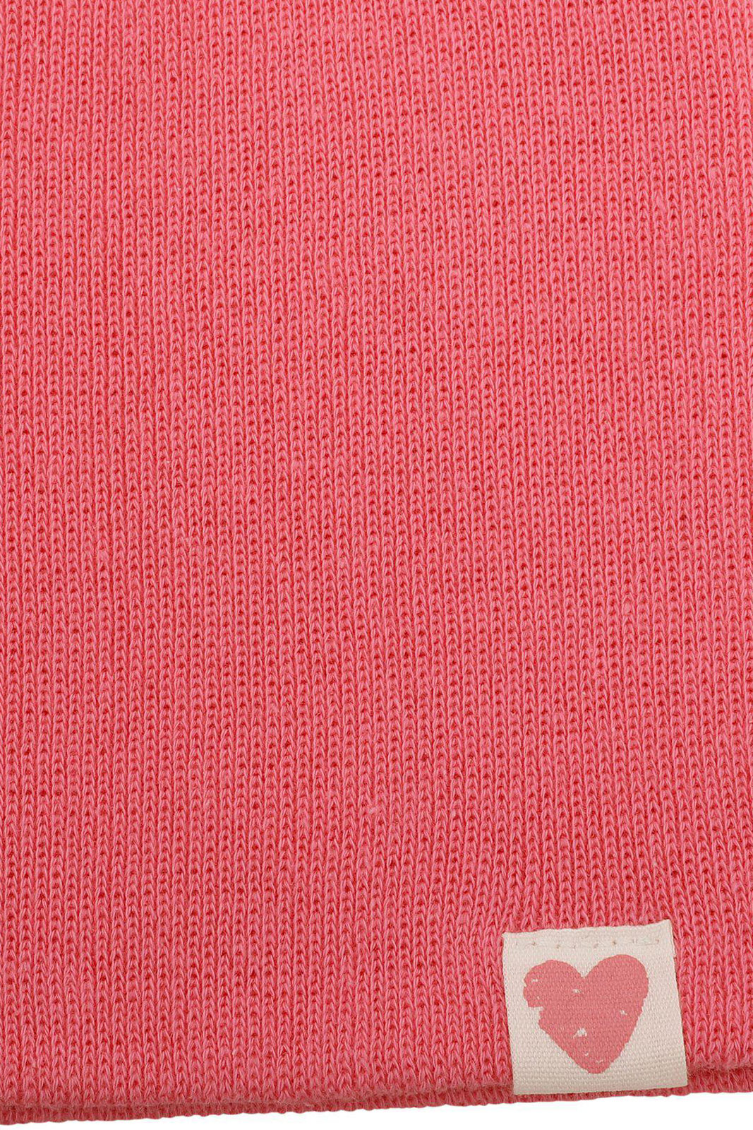 Barnmössa med vävd etikett